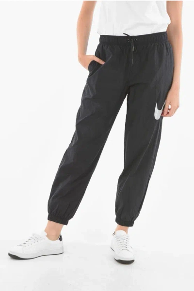 Nike Mid Waist Loose Fit Joggers With Contrasting Logo In Black