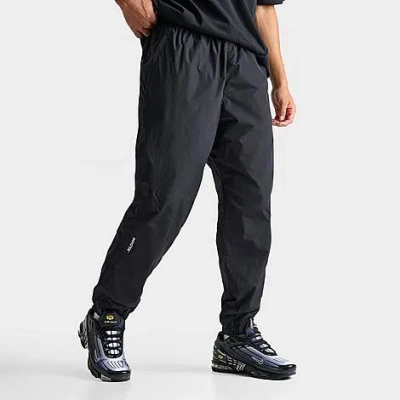 Nike Nocta Northstar Nylon Track Pants In Black/black/white