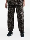 Nike Nsw Phoenix Printed Track Pants In Brown