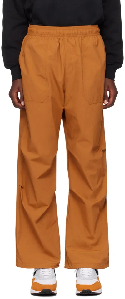 Nike Orange Drawstring Trousers In Desert Bronze