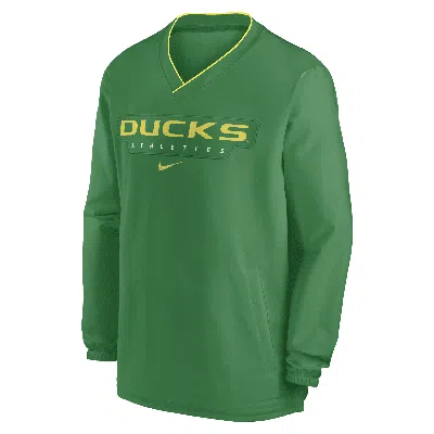 Nike Oregon Ducks Sideline  Men's College Long-sleeve Windshirt In Green