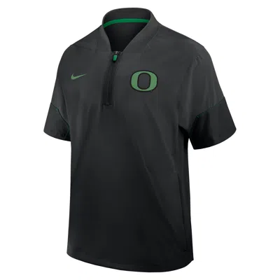 Nike Oregon Sideline Coach  Men's College 1/2-zip Short-sleeve Hooded Jacket In Black