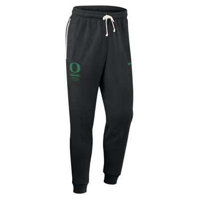 Nike Oregon Sideline Standard Issue  Men's Dri-fit College Taper Pants In Black