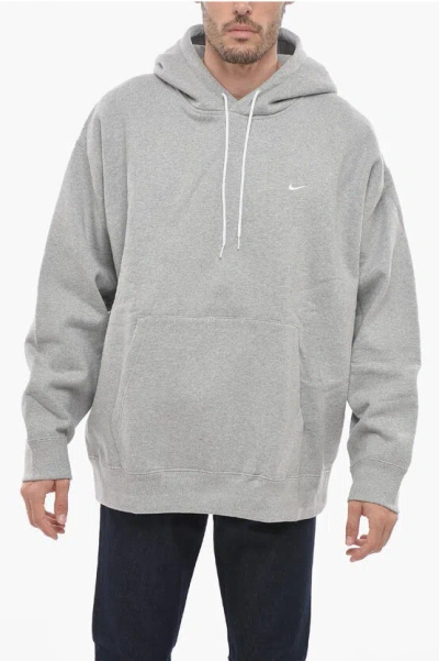 Nike Patch Pockets Fleeced-cotton Hoodie In Gray