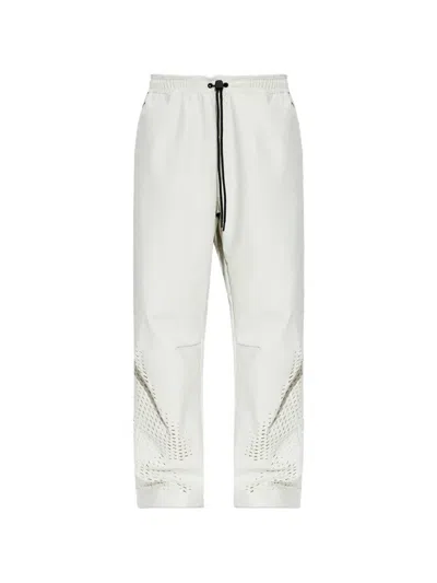 Nike Perforated-detail Wide-leg Track Pants In Neutral