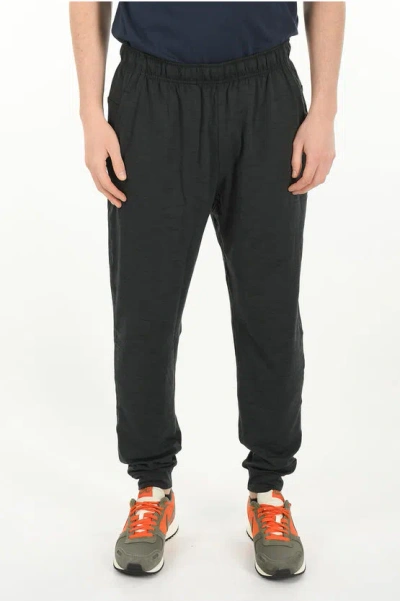 Nike Printed Logo Dri-fit Joggers In Black