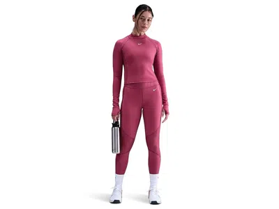 Nike Pro Dri-fit Warm Long Sleeve Grid Graphic Top In Pink