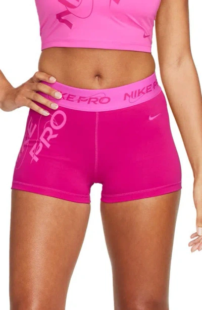 Nike Pro Mid Rise Graphic Training Shorts In Fire Berry/ Laser Fuchsia