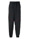 Nike Red Panel Tracksuit Bottoms In Black