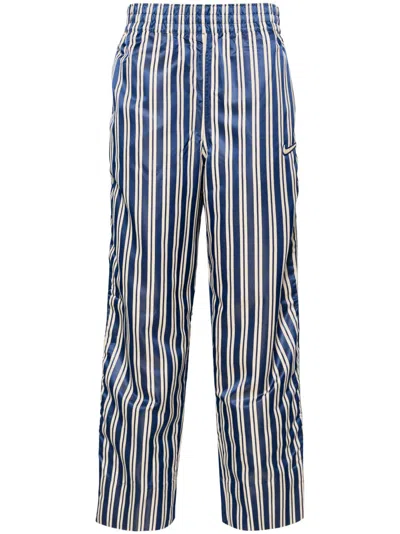 Nike Royal Blue And Ecru White Satin Finish Striped Track Pants In Neutrals