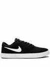 Nike Sb Check Solar Canvas Sneakers In Black