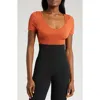 Nike Short Sleeve Rib Sweater Bodysuit In Burnt Sunrise/sunrise/black