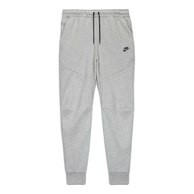 Nike Solid Color Bundle Feet Sports Long Pants Light Grey In Gray
