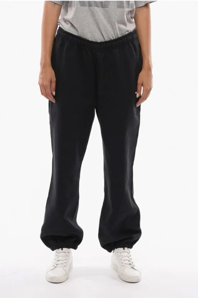 Nike Solid Color Fleeced Cotton Joggers In Black