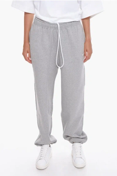 Nike Solid Color Fleeced Cotton Joggers In Gray