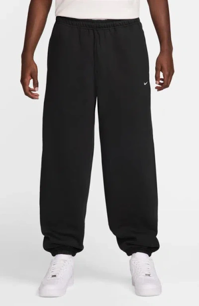 Nike Solo Swoosh Fleece Sweatpants In Black
