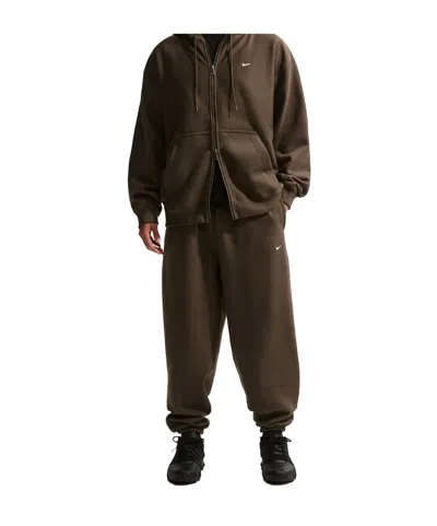 Nike Solo Swoosh Trousers In Brown