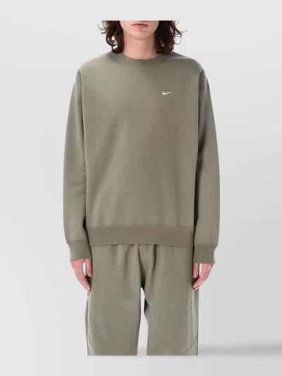 Nike Solo Swoosh Relaxed Fit Crewneck In Green