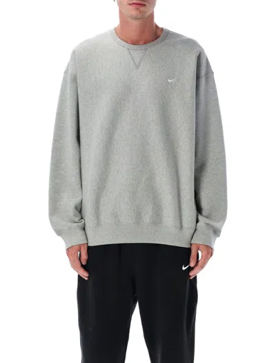 Nike Solo Swoosh Oversized Logo-embroidered Cotton-blend Jersey Sweatshirt In Gray