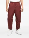 Nike Solo Swoosh Track Pants In Red