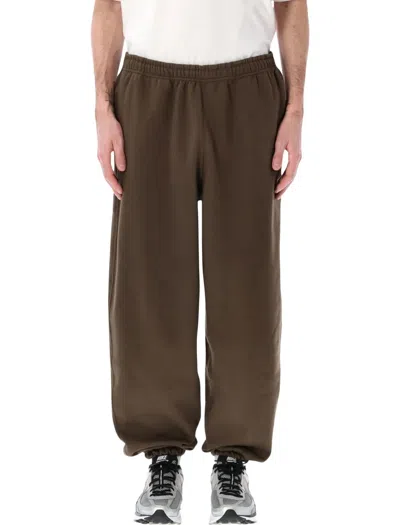Nike Solo Swoosh Track Pants In Brown