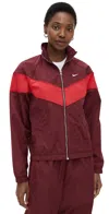 Nike Women's Windrunner Loose Uv Woven Full-zip Jacket (plus Size) In Dark Team Red/university Red