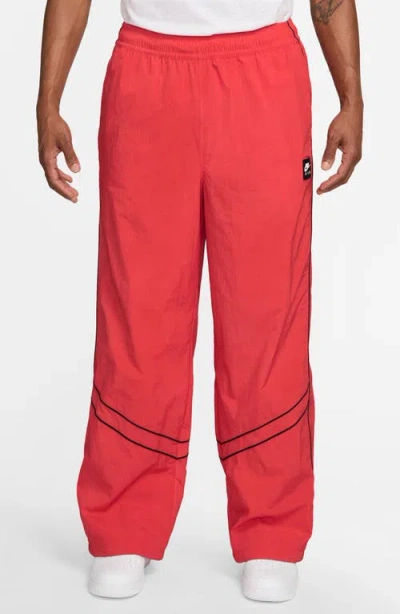 Nike Sportswear Air Water Repellent Track Pants In Red