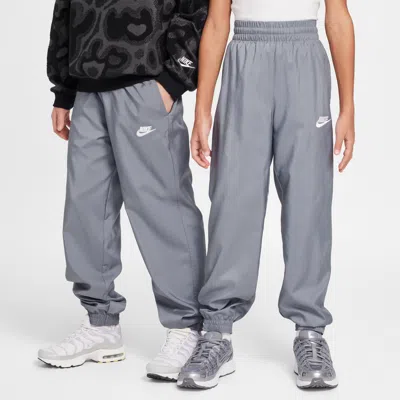 Nike Sportswear Club Big Kids' Woven Jogger Pants In Grey