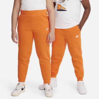 Nike Sportswear Club Fleece Big Kids' Jogger Pants (extended Size) In Orange