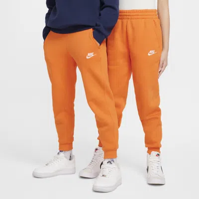 Nike Sportswear Club Fleece Big Kids' Jogger Pants In Orange
