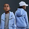 Nike Sportswear Tech Fleece Big Kids' (boys') Full-zip Hoodie With Reflective Accents In Blue