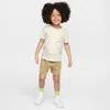 Nike Sportswear Toddler On The Move Printed Tee And French Terry Shorts Set In Brown