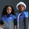 Nike Sportswear Windrunner Big Kids' Hooded Repel Jacket In Blue