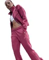 Nike Sportswear Women's Windrunner Mid-rise Slim Knit Pants In Pink