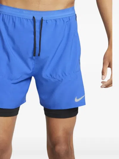 Nike Stride Dri-fit 5" Hybrid "game Royal/black" Running Shorts In 蓝色
