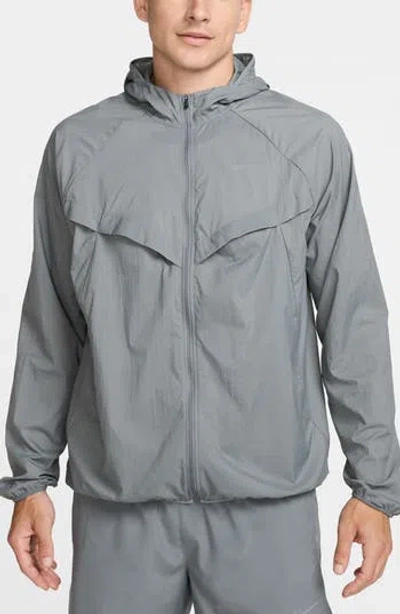 Nike Stride Dri-fit Uv Hooded Running Jacket In Smoke Grey/ Reflective Silv