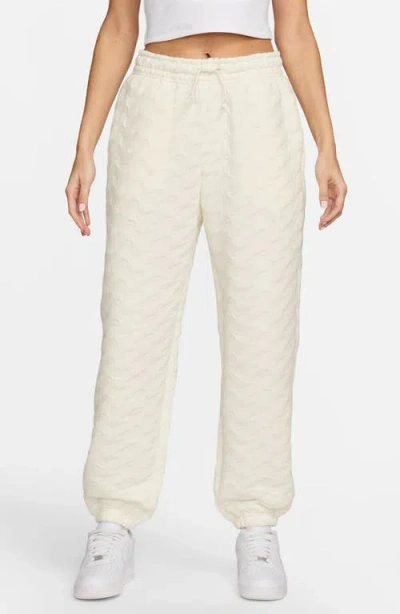 Nike Swoosh Jacquard Phoenix Fleece Joggers In White