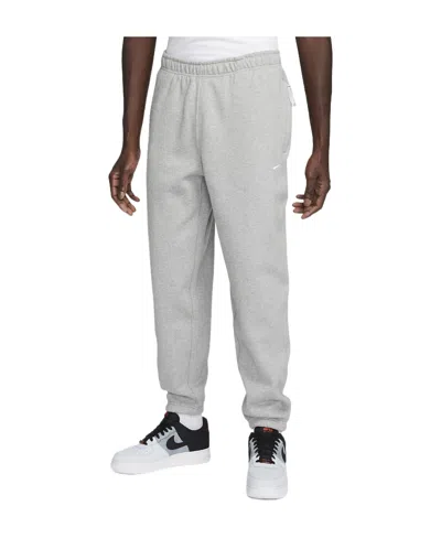 Nike Solo Swoosh Tapered Logo-embroidered Cotton-blend Jersey Sweatpants In Gray