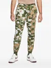 Nike Tech Fleece All-over Print Track Pants In Green