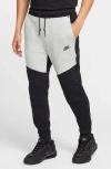 Nike Slim-fit Tapered Logo-print Cotton-blend Tech Fleece Sweatpants In Black