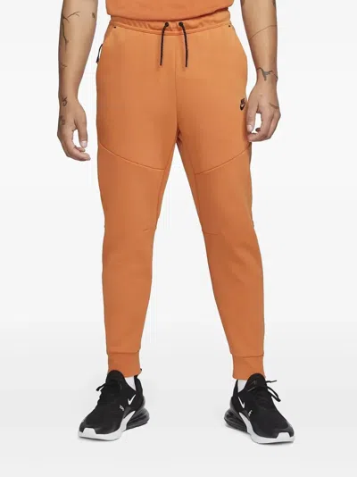 Nike Tech Fleece Joggers In Orange