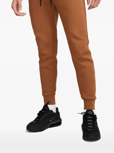 Nike Tech Fleece Track Pants In Brown