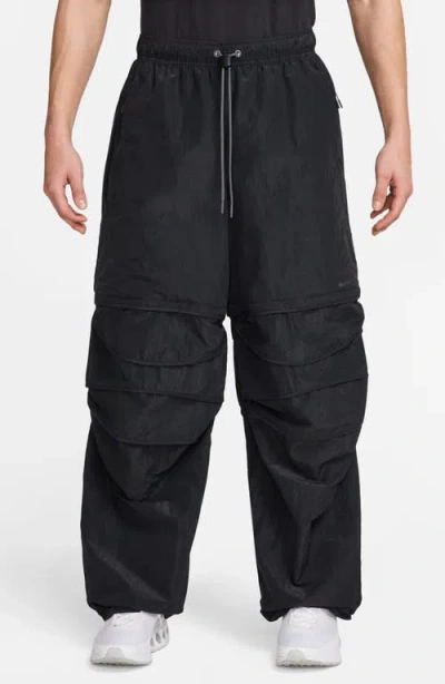 Nike Tech Woven Convertible Oversized Pants In Blue