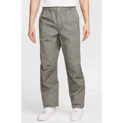 Nike Tech Woven Flat Front Pants In Gray
