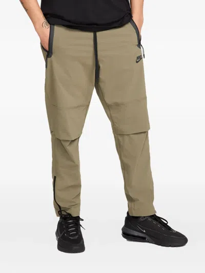 Nike Tech Woven Track Pants In Green