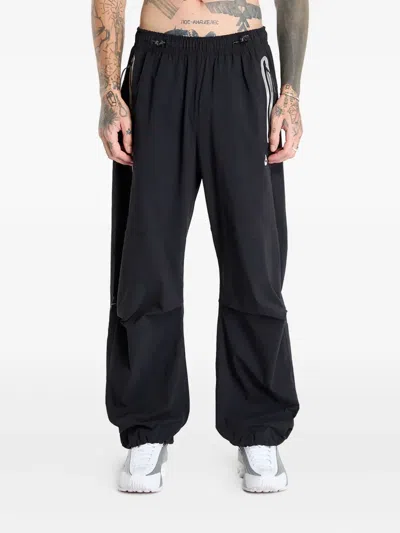 Nike Tech Woven Trousers In Black