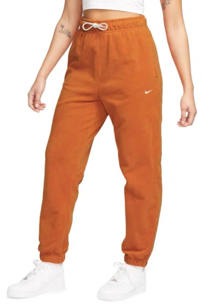 Nike Therma-fit Pants In Campfire Orange/ Pale Ivory