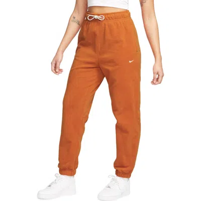 Nike Therma-fit Pants In Campfire Orange/pale Ivory