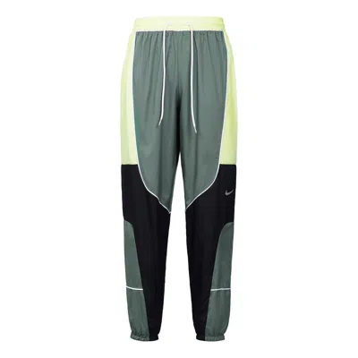 Nike Throwback Colorblock Woven Basketball Bundle Feet Sports Pants In Green