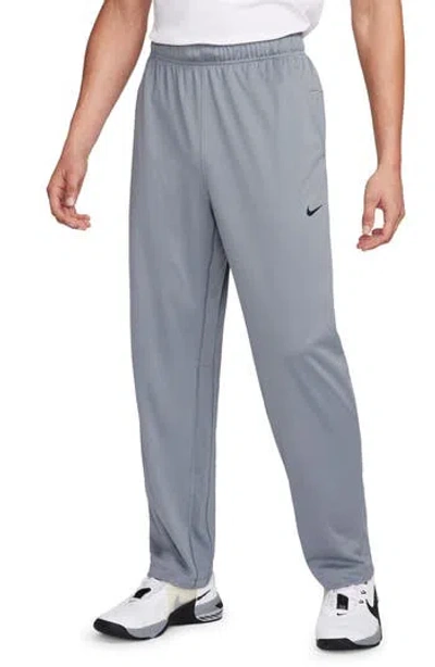 Nike Totality Men's Dri-fit Tapered Versatile Pants In Grey